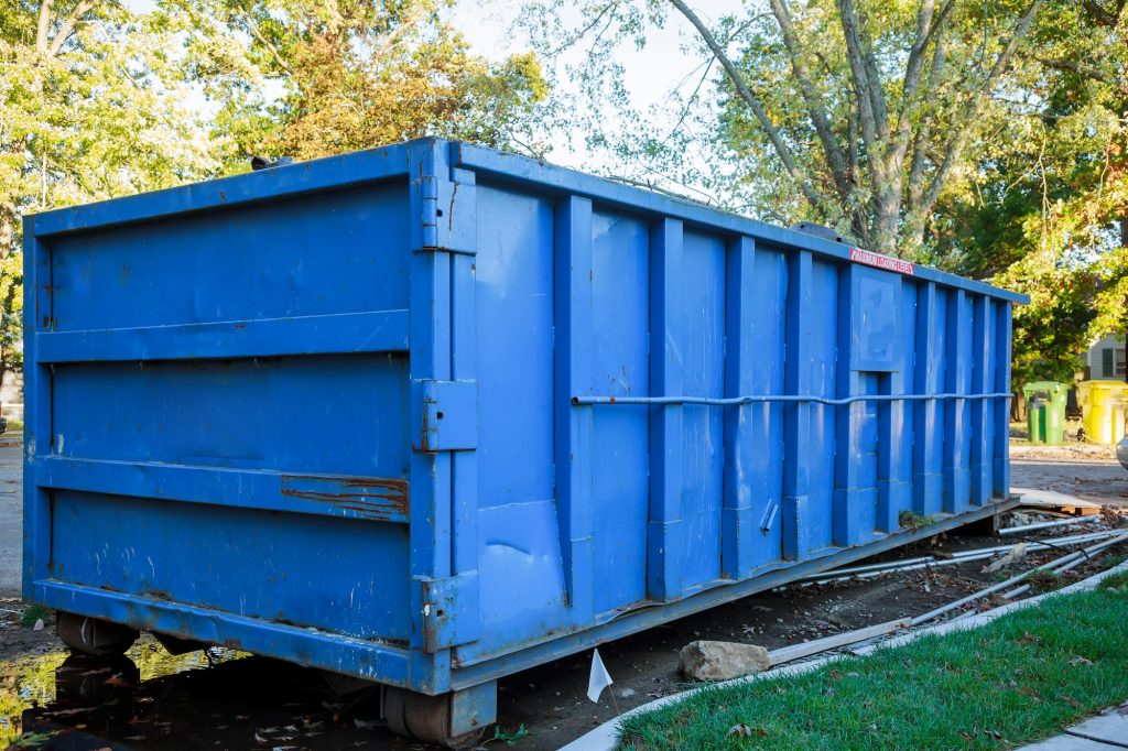 Loaded dumpster near a construction site